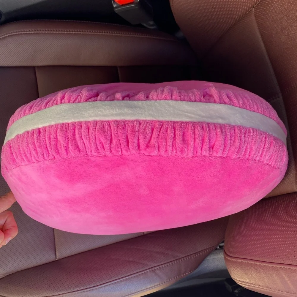 Pink micro fleece plush pink and white round accent pillow.‎